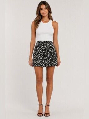 Calvin Klein Jeans Black Mini Skirt with White Floral Pattern Red Tag Vintage